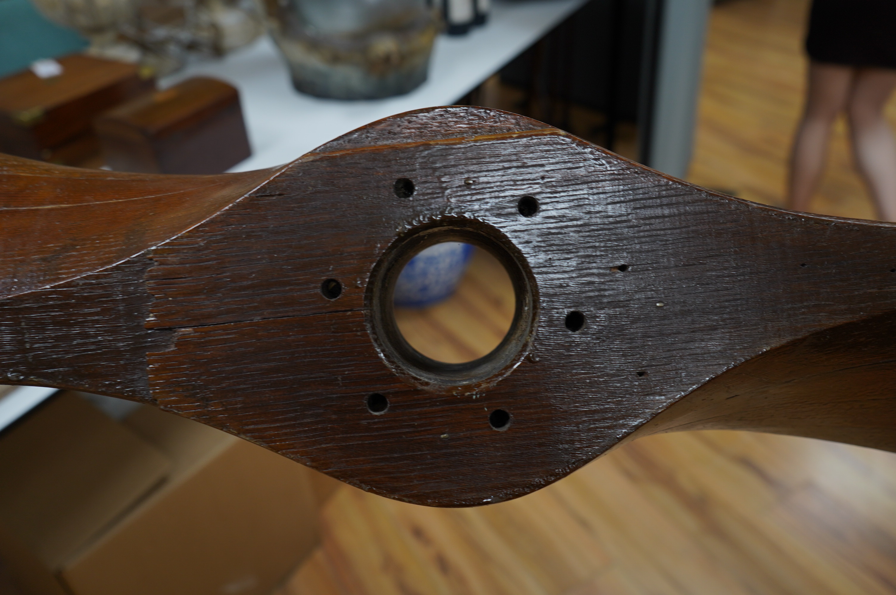 An early 20th century American laminated oak propeller with copper clad blade edges, Paragon stamp to the blade, 251cm wide. Condition - good